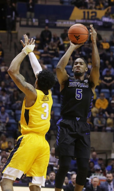 Massinburg scores 43, Buffalo stuns No. 13 WVU 99-94 in OT
